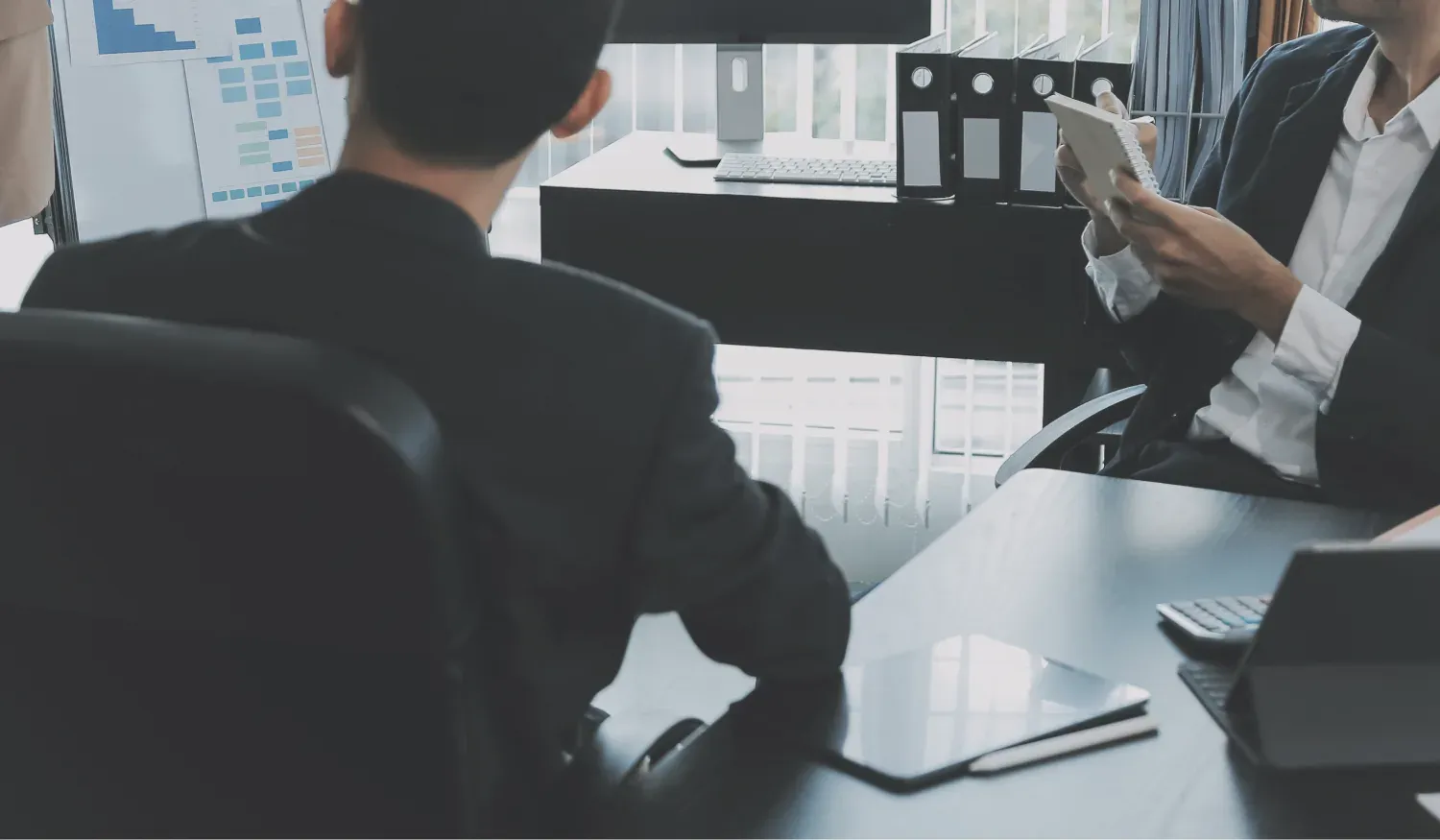 Advisors reviewing a financing plan together